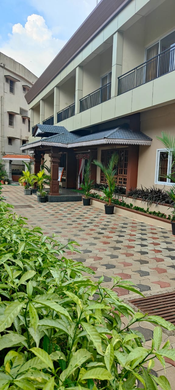 Front view of Parijatha Conventional Hall and Hotel Parijatha Inn, Dharmasthala