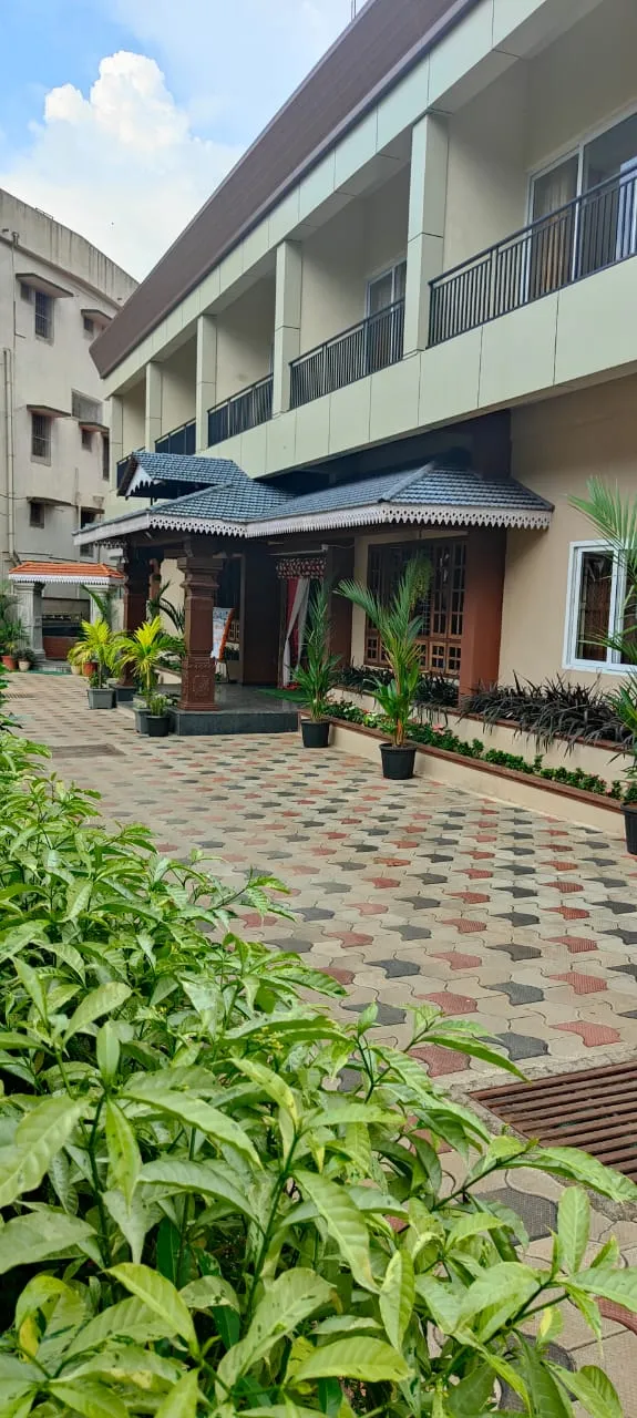 Front view of Parijatha Conventional Hall and Hotel Parijatha Inn, Dharmasthala